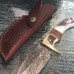 9-inch Damascus skinning knife with brown stag handle and sheath