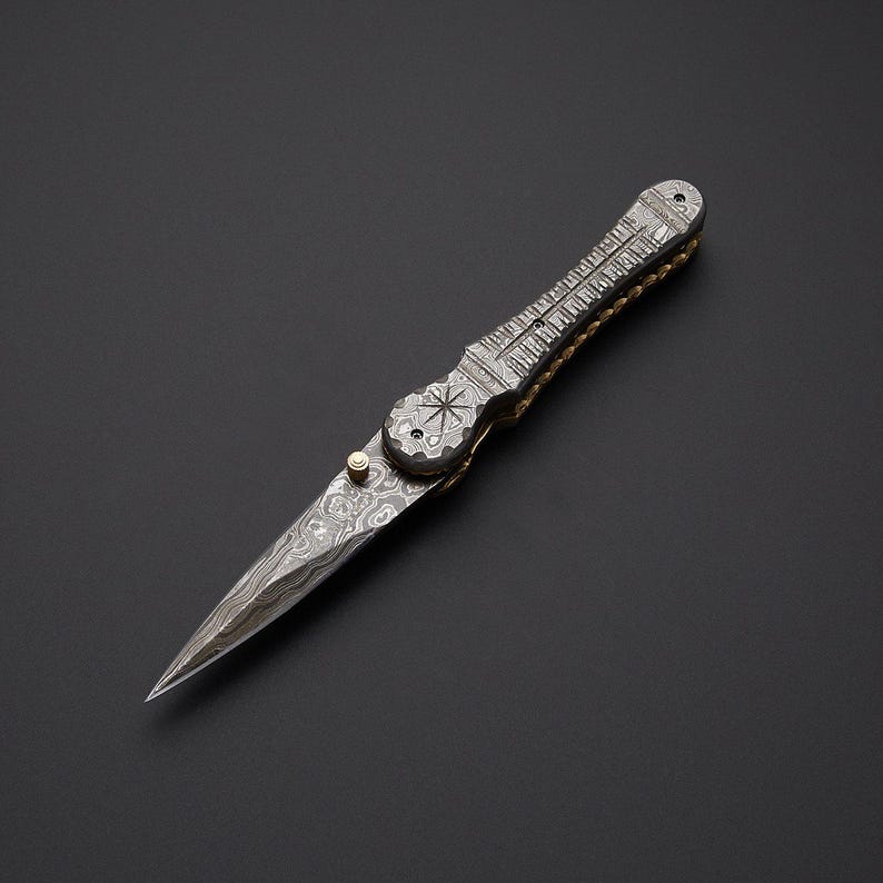 Handcrafted Damascus steel folding pocket knife with leather pouch
