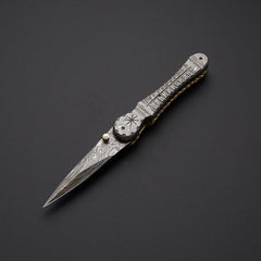 Handcrafted Damascus steel folding pocket knife with leather pouch