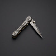 Handcrafted Damascus steel folding pocket knife with leather pouch