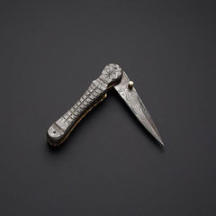 Handcrafted Damascus steel folding pocket knife with leather pouch