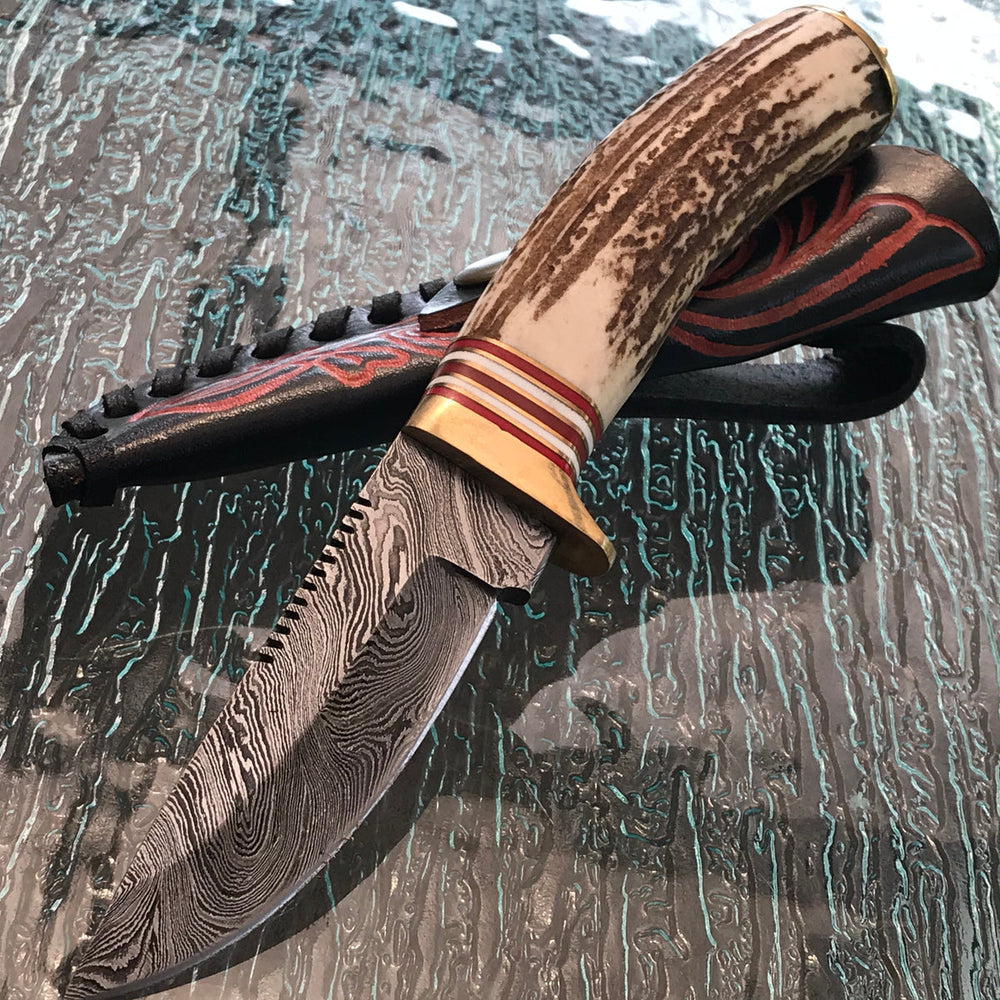 Handmade Damascus steel skinning knife with stag handle and sheath