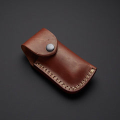 Handcrafted Damascus steel folding pocket knife with leather pouch