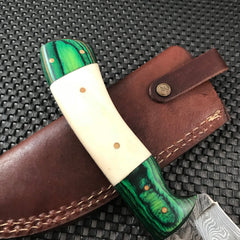 Hand forged Damascus hunting knife with buffalo horn handle and leather sheath