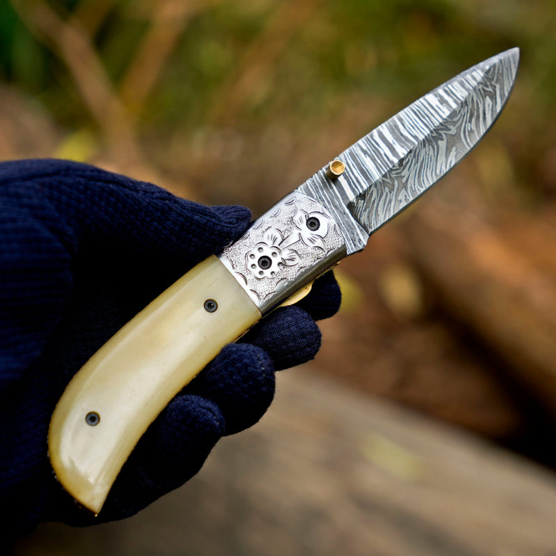 LunarLoom hand forged Damascus folding knife with leather sheath